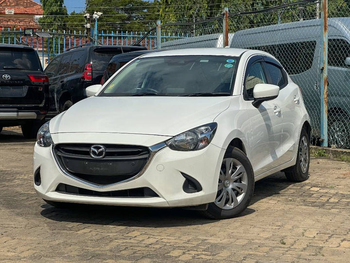 2019 Mazda Demio in white, photo 1 of 12, for sale in Kenya (Ref M19-25142)