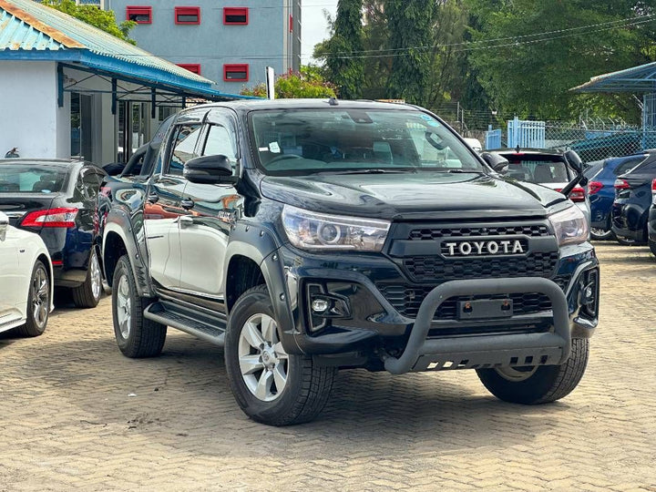 2019 Toyota Hilux in black, photo 1 of 12, for sale in Kenya (Ref T19-09887)
