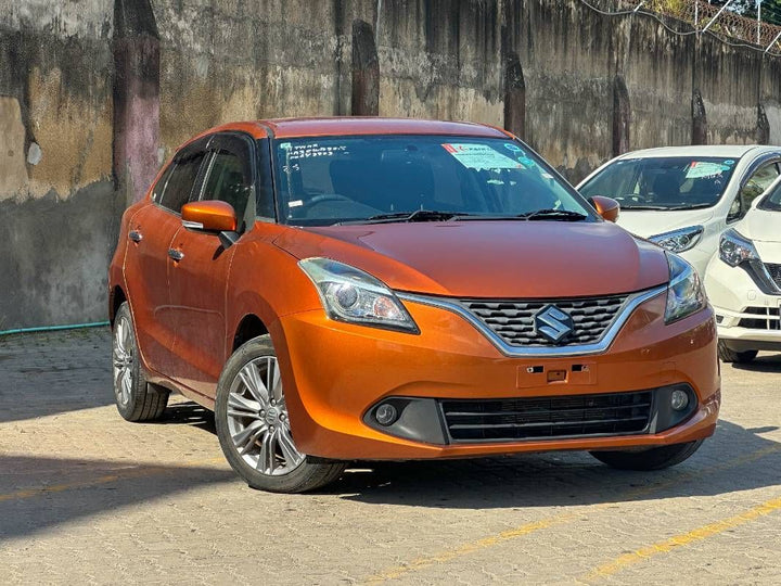 2019 Suzuki Baleno in orange, photo 1 of 12, for sale in Kenya (Ref S19-43923)