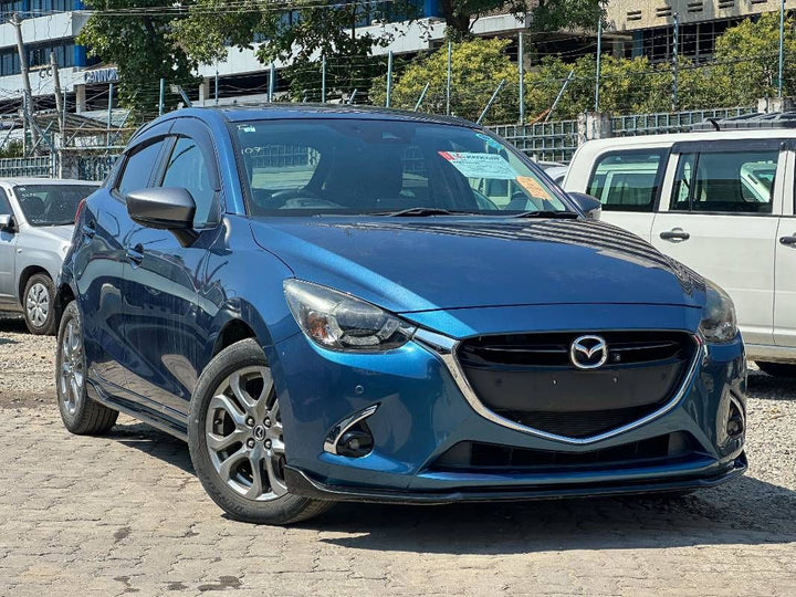 2019 Mazda Demio in blue, photo 1 of 12, for sale in Kenya (Ref M19-11192)
