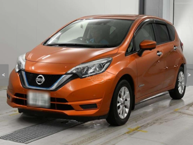 2019 Nissan Note in orange, photo 1 of 4, for sale in Kenya (Ref N19-81408)