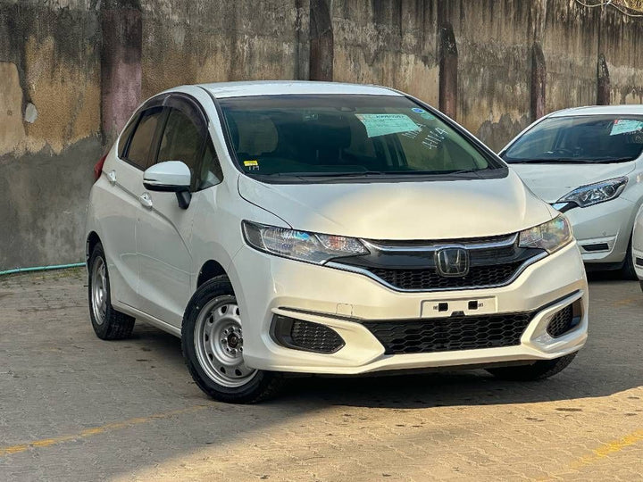 2019 Honda Fit in white, photo 1 of 12, for sale in Kenya (Ref H19-41164)